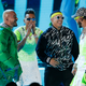 Illustration for article titled Glitter, Glam, and Bad Bunnys Acrylic Fingernails Ruled the Billboard Latin Music Awards